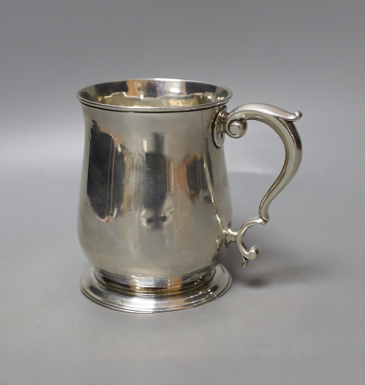 A George II silver baluster mug, Shaw & Priest, London, 175, 11.5cm, 10.5oz (a.f.).